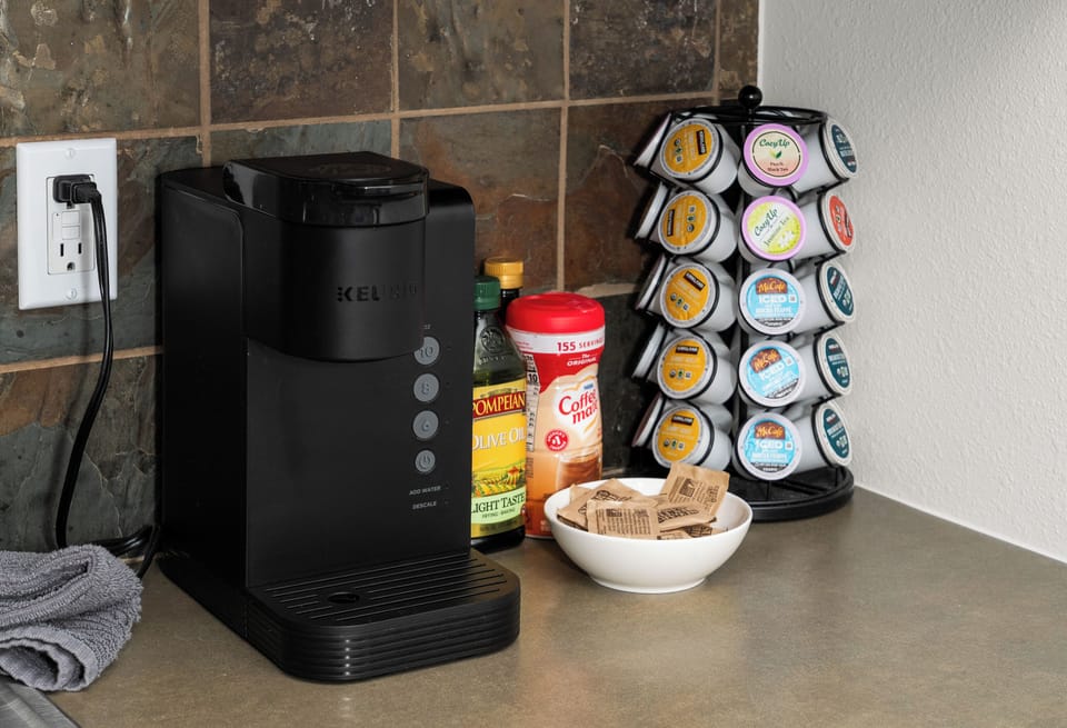 Convenient coffee station with Keurig and assorted pods for easy mornings