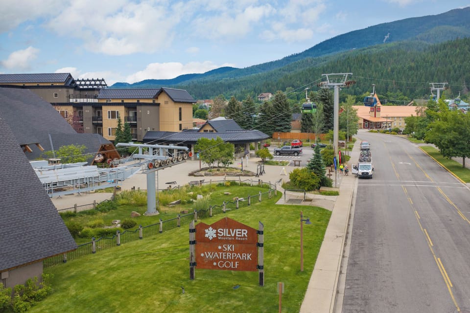 Steps from the gondola in a scenic mountain resort village