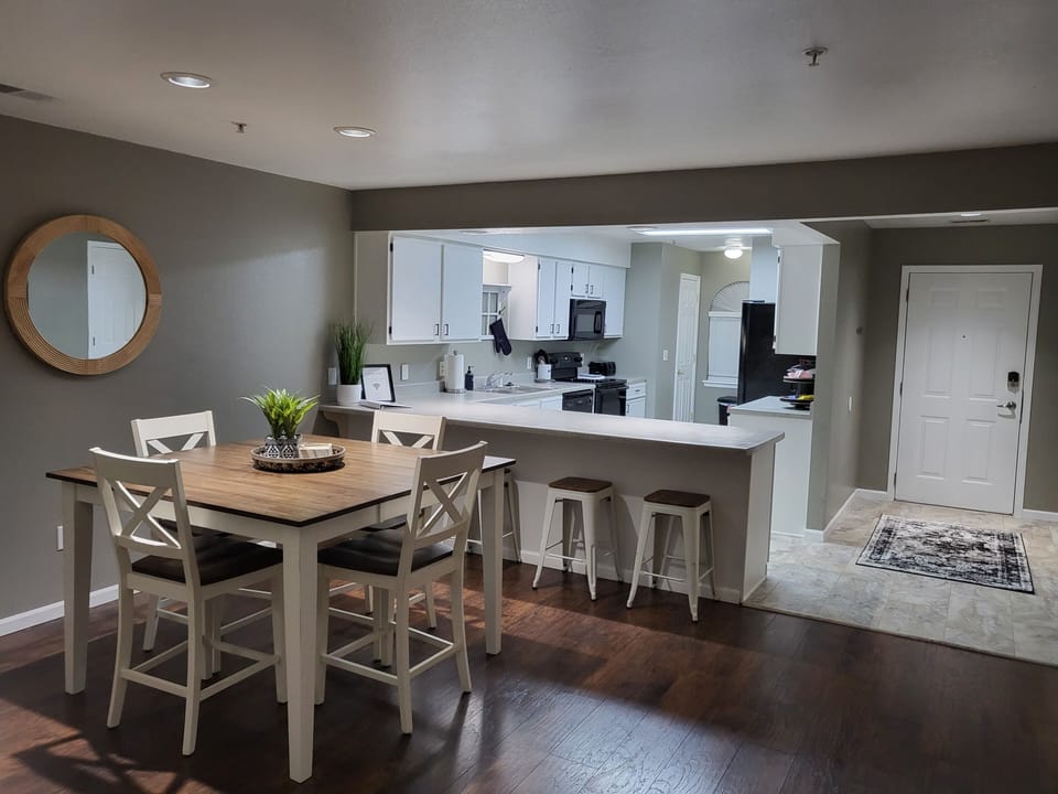 Dining table and bar stools for seating