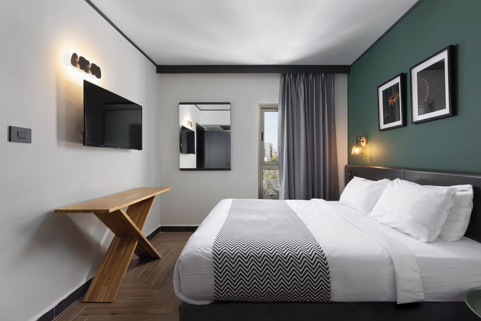 Comfort Suite, 2 Bedrooms, City View | Minibar, free WiFi, bed sheets