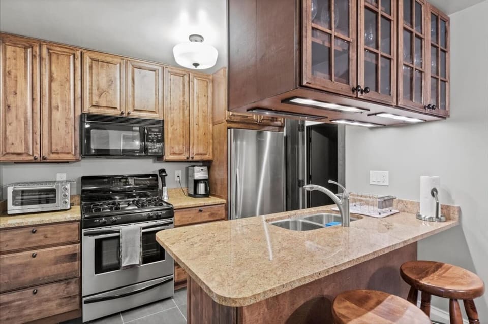 Second floor kitchen, bar, and full bath!