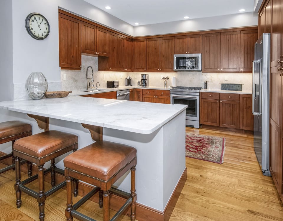 Condo, 4 Bedrooms | Private kitchen | Fridge, oven, coffee/tea maker, toaster