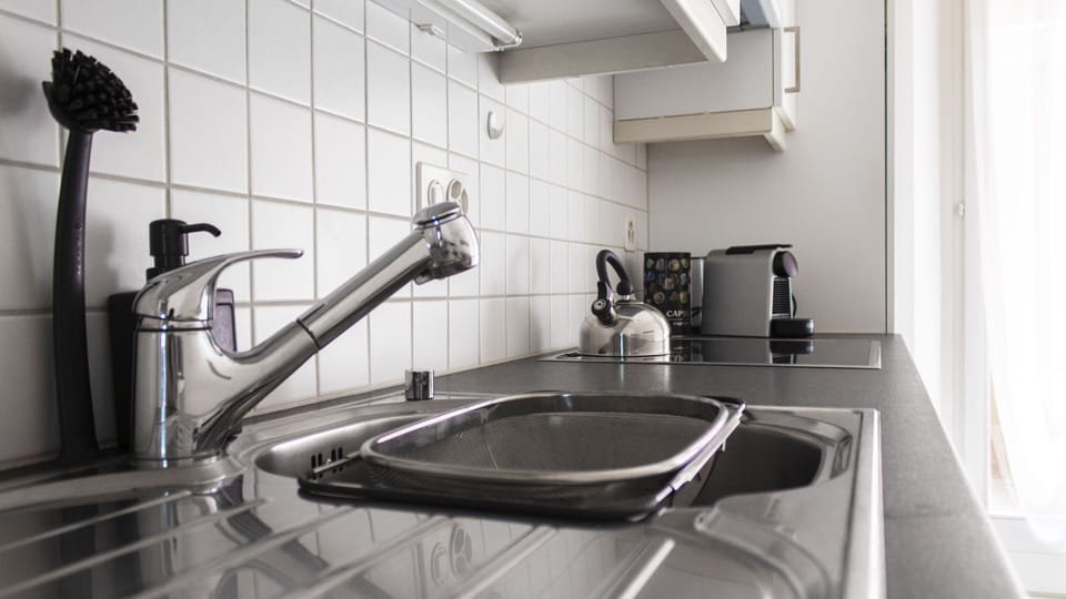 Family Apartment (04 - Giove) | Private kitchen | Full-size fridge, microwave, oven, stovetop