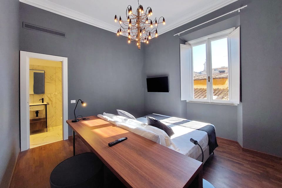 Deluxe Room | Premium bedding, in-room safe, desk, blackout drapes