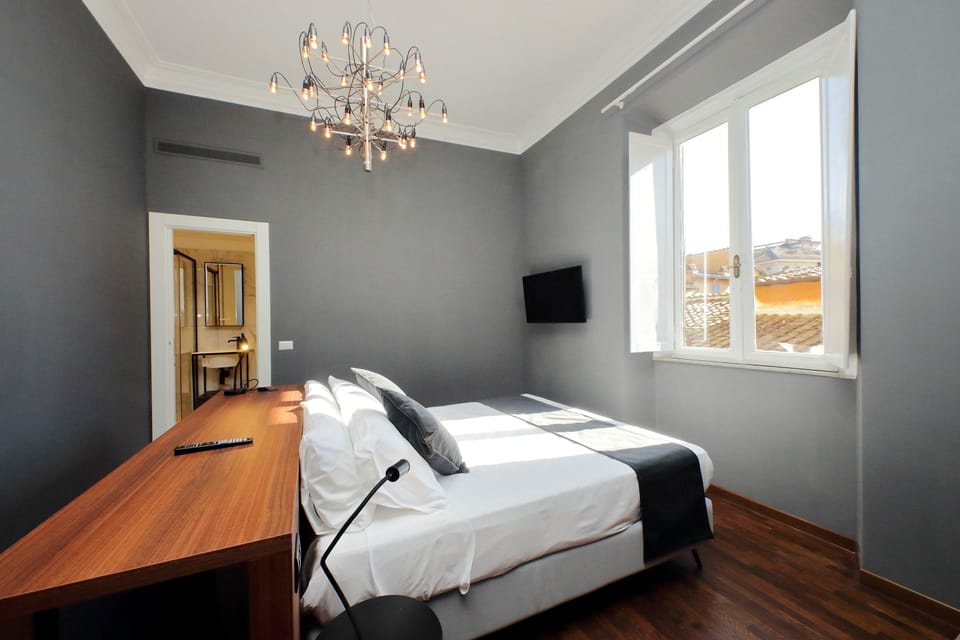 Deluxe Room | Premium bedding, in-room safe, desk, blackout drapes
