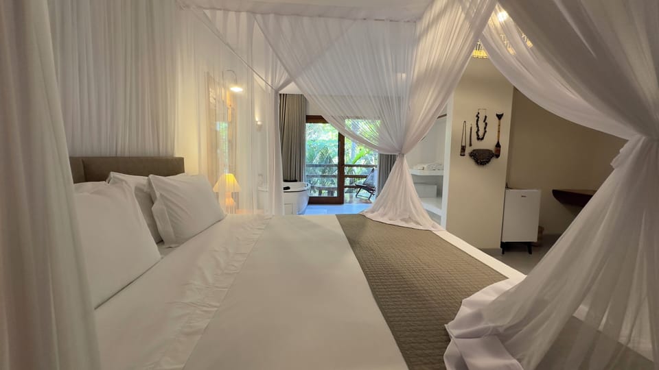 Suíte Super Luxo com Banheira | Premium bedding, pillowtop beds, minibar, individually decorated