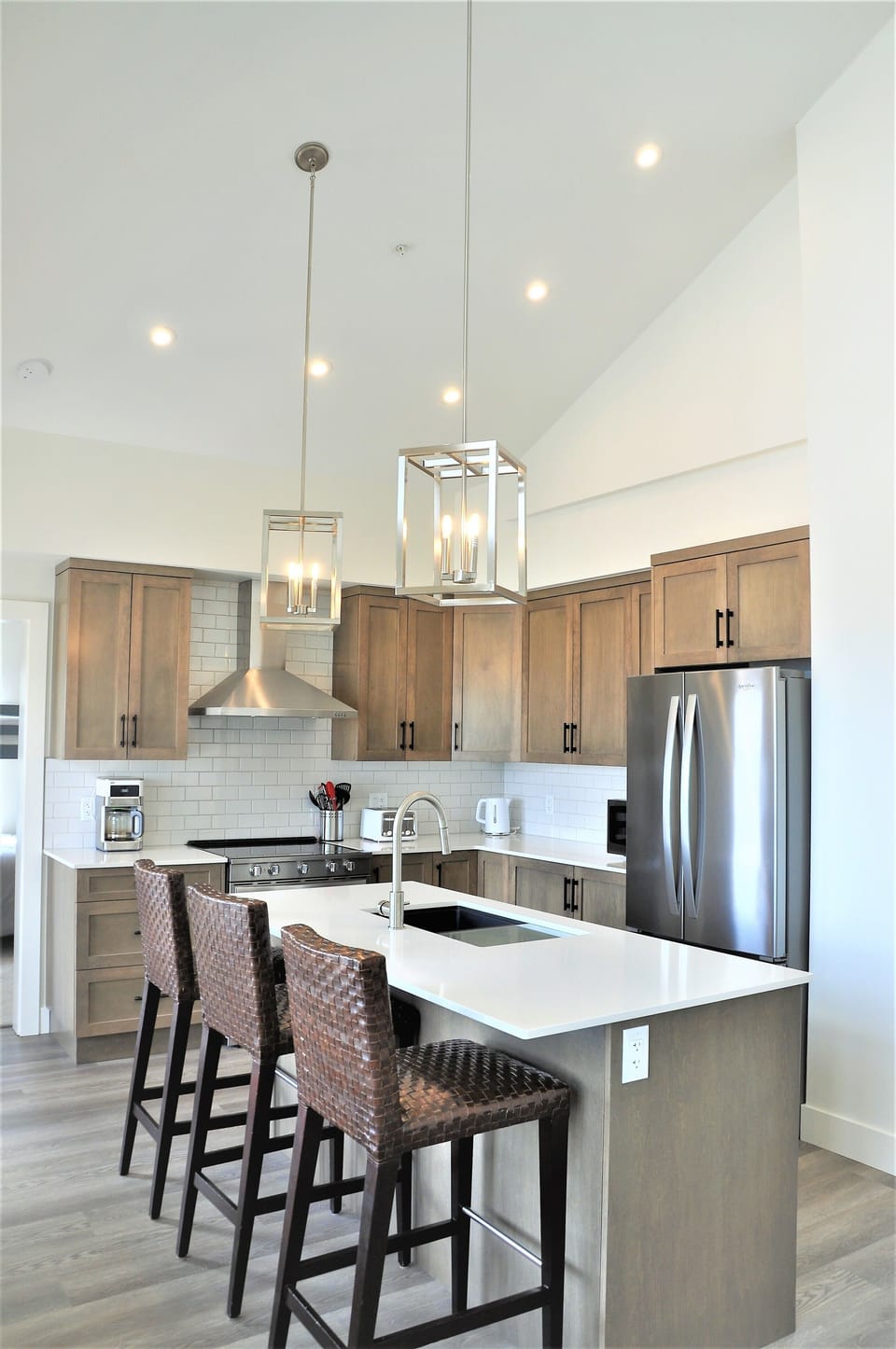 Fully stocked kitchen with coffee maker, kettle, dishes, pots/pans & basic spice