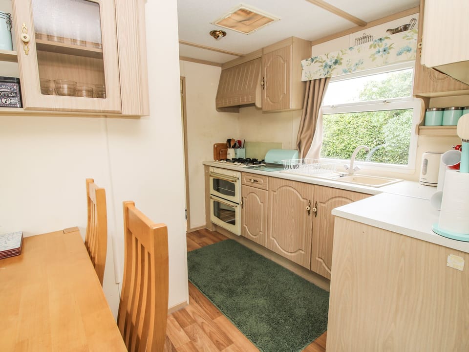Fridge, electric kettle, toaster, cookware/dishes/utensils