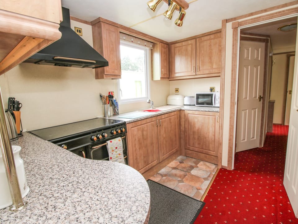 Fridge, toaster, cookware/dishes/utensils