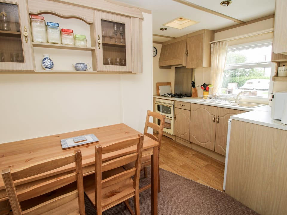 Fridge, electric kettle, toaster, cookware/dishes/utensils
