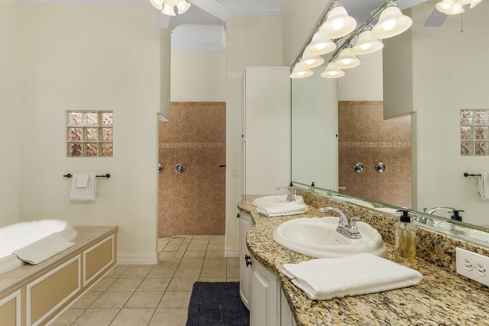 Master bath with double sinks & double shower heads. Walk-in shower. Jetted tub.
