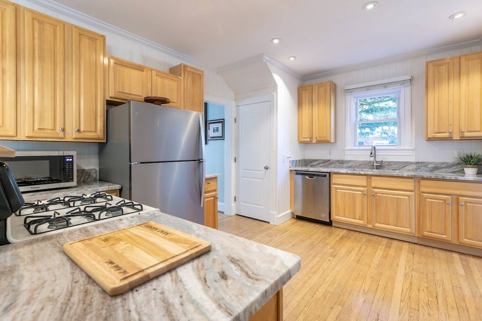 The newly renovated kitchen has all high-end appliances and countertops.