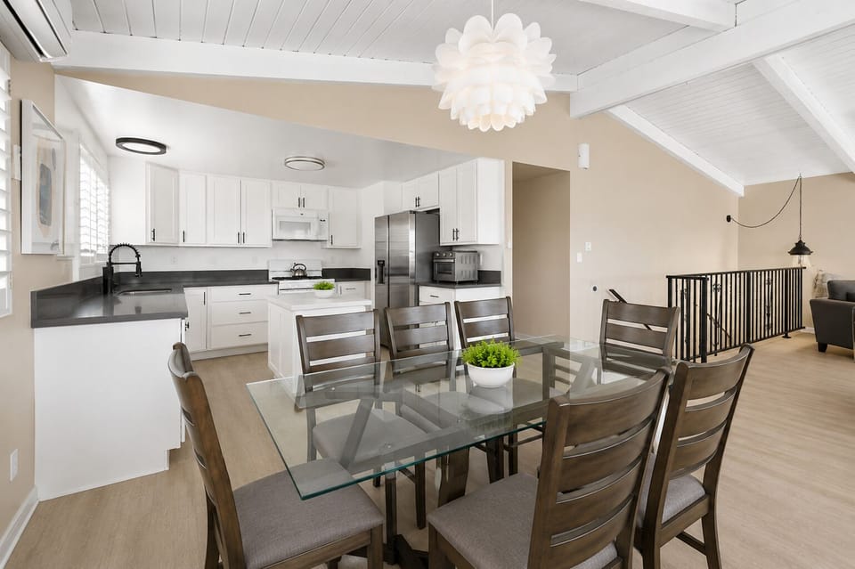 Kitchen Excellence: Experience the Joy of Cooking in Our Spacious, Fully Loaded Kitchen, Complete with Spice and Knife Racks, Cookware Galore, and a Convenient Coffee Bar.