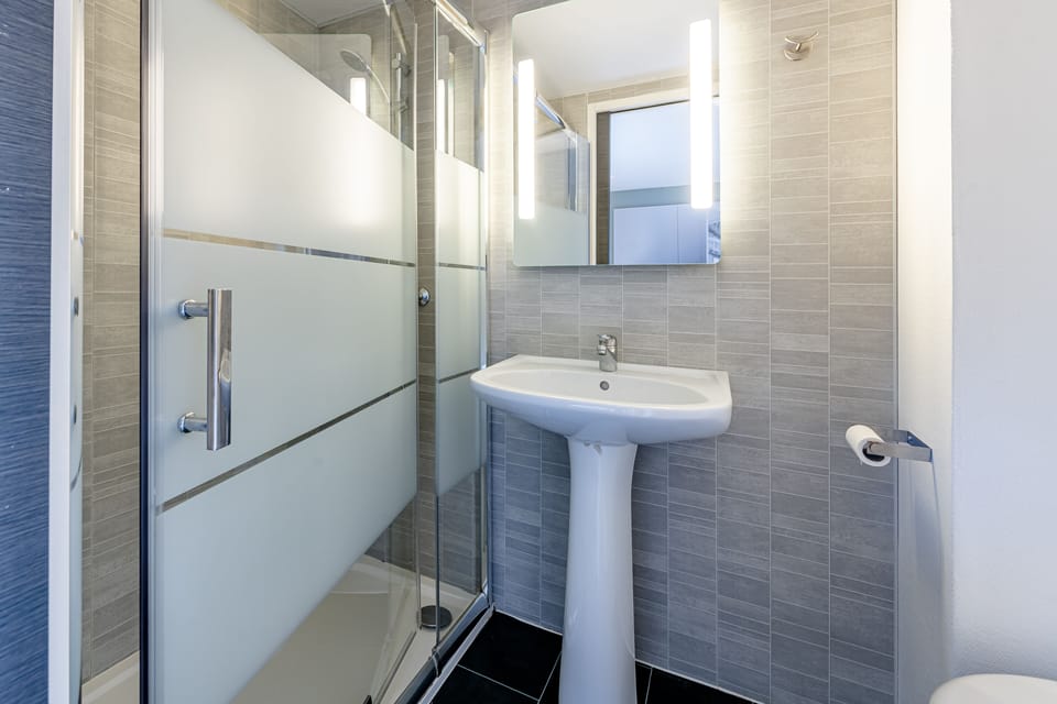Shower, free toiletries, hair dryer, towels