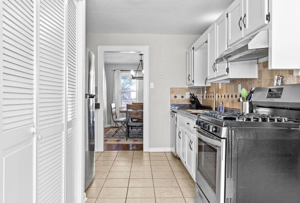 Convenient layout connecting the kitchen to dining and living areas, making it easy to cook, dine, and entertain during your Kansas City visit.