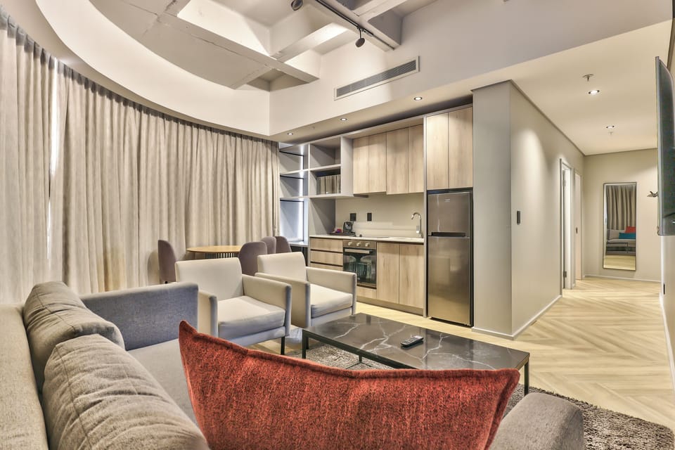 Apartment, 2 Bedrooms | Living room | Flat-screen TV