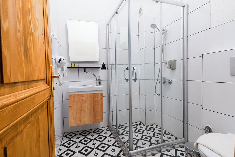 Economy Double Room | Bathroom | Slippers