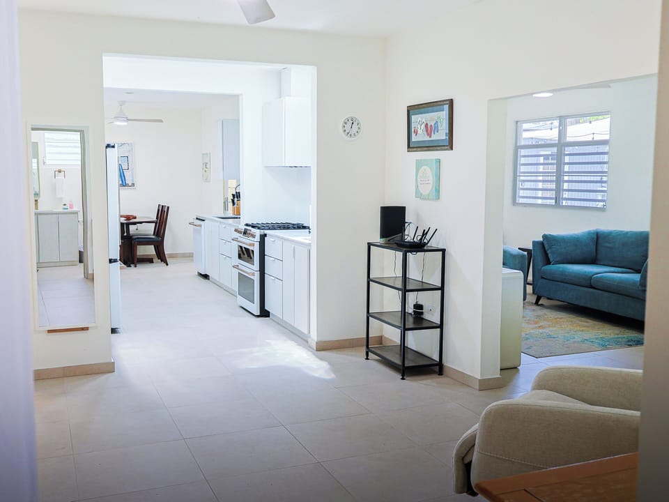 View of house from additional living area with recliner.