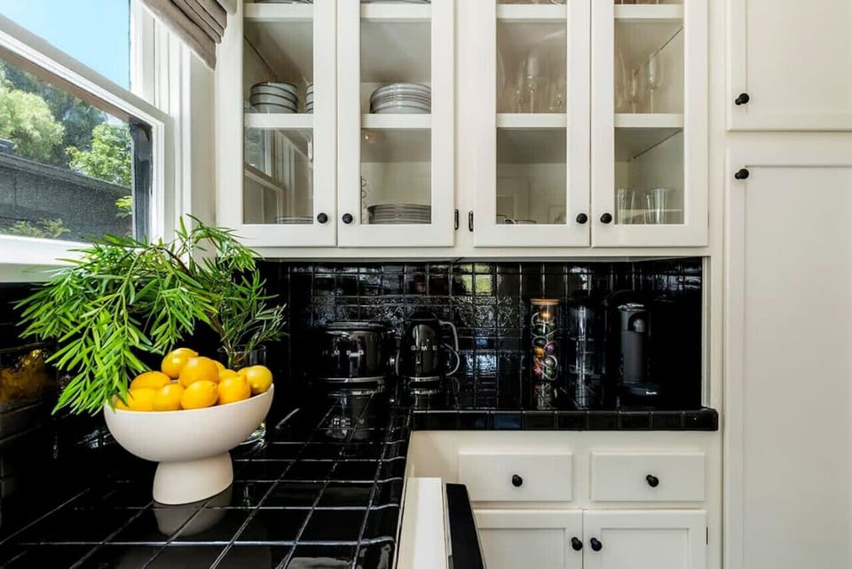 A delightful fruit basket bringing freshness and vibrance to the kitchen space.