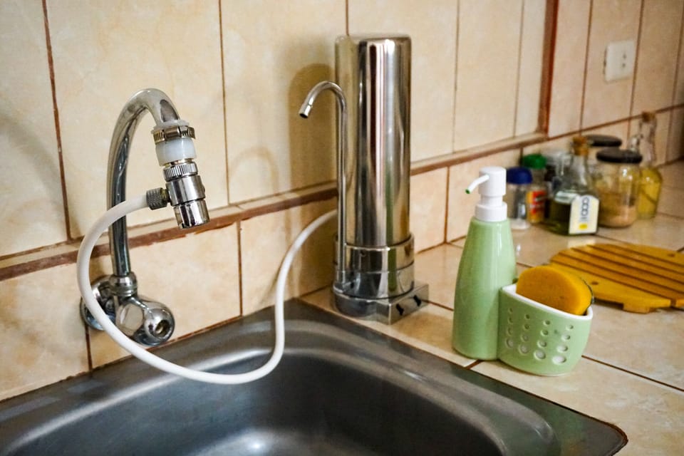 Water purifier: it makes tap water drinkable so you don't have to buy bottles!