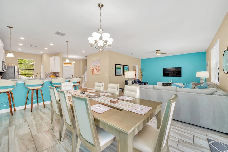 Spacious dining area and modern kitchen, perfect for hosting family meals and gatherings in style an