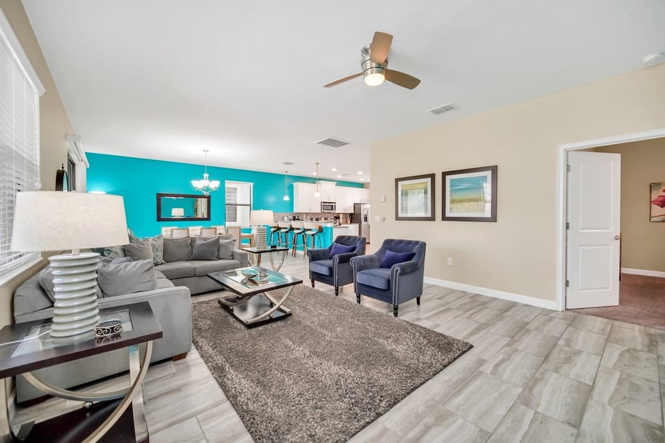 Spacious and beautifully designed living room with a seamless flow into the dining area.