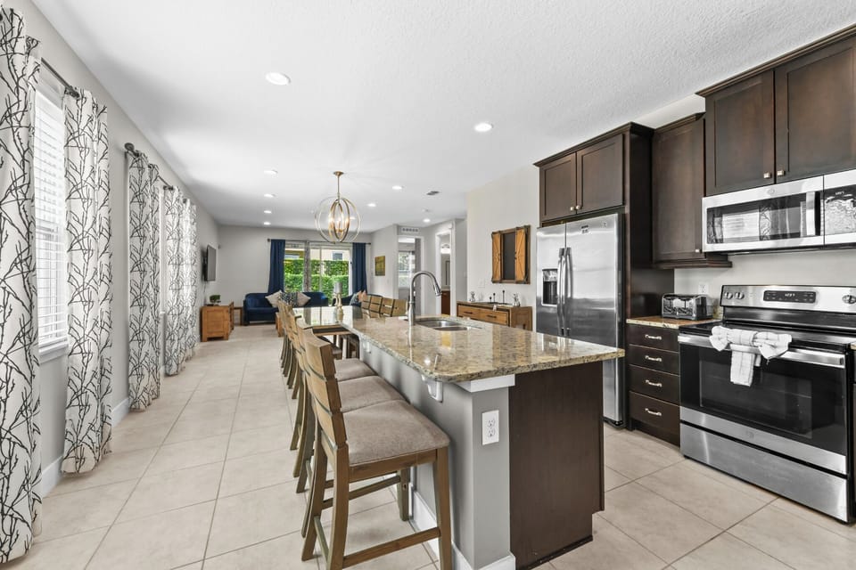 KITCHEN:  Fully Equipped Kitchen with Seating for 3 at Kitchen Island