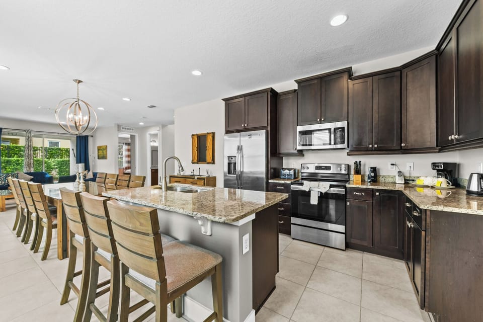 KITCHEN:  Side-by-Side Refrigerator, Microwave, Stove and Dishwasher 