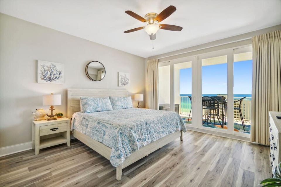 Primary Bedroom with Ocean Views, King Size Bed, Flat Screen TV, Ensuite Bathroom and Private Balcony Access