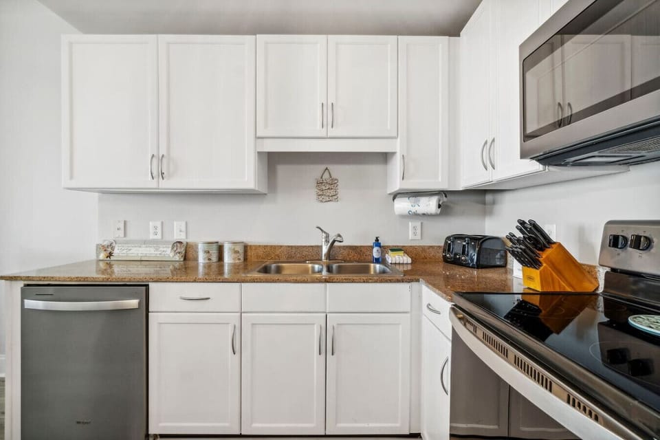 Fully Stocked Kitchen with Ocean Views and Island Bar Seating