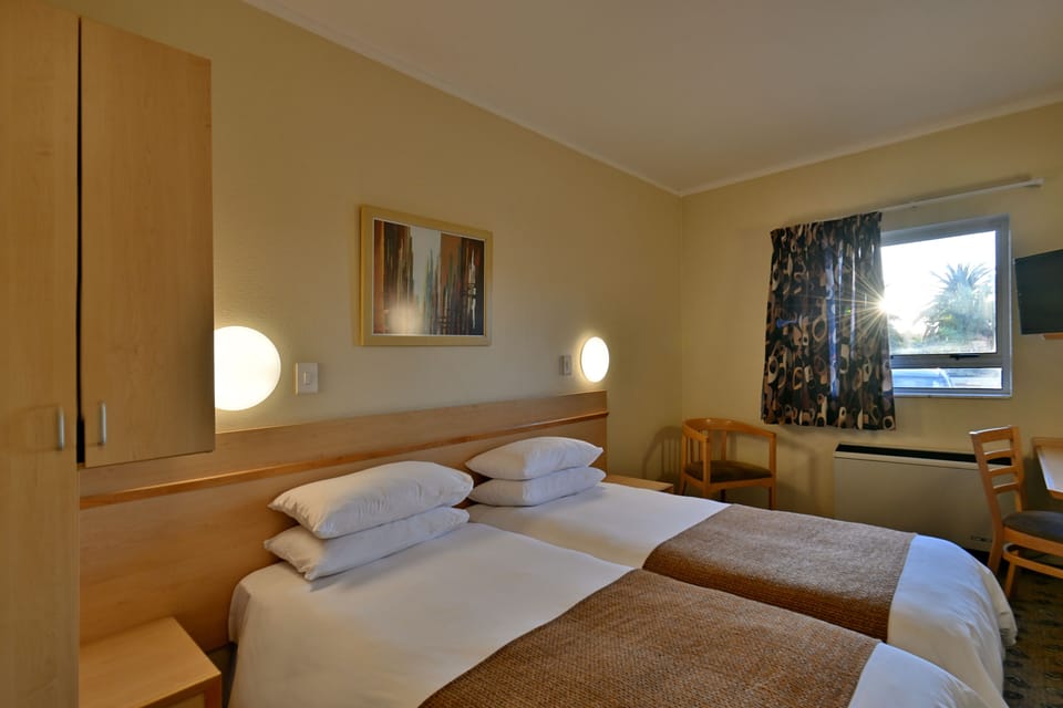 Desk, blackout drapes, iron/ironing board, free WiFi