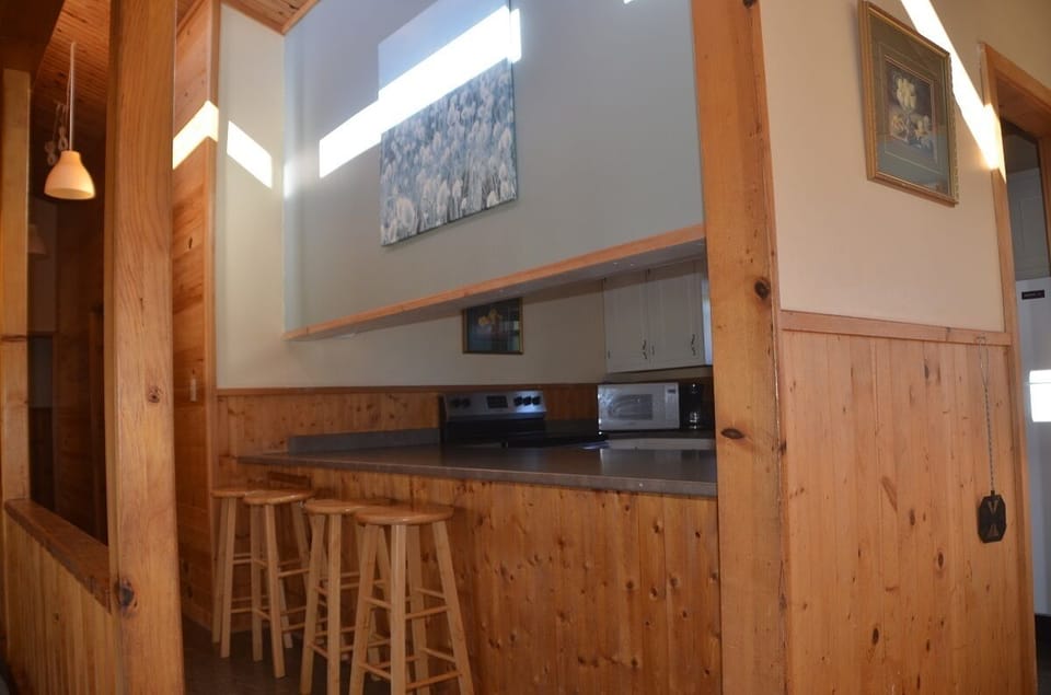 Cottage, 4 Bedrooms | Private kitchen | Coffee/tea maker, electric kettle, highchair, paper towels