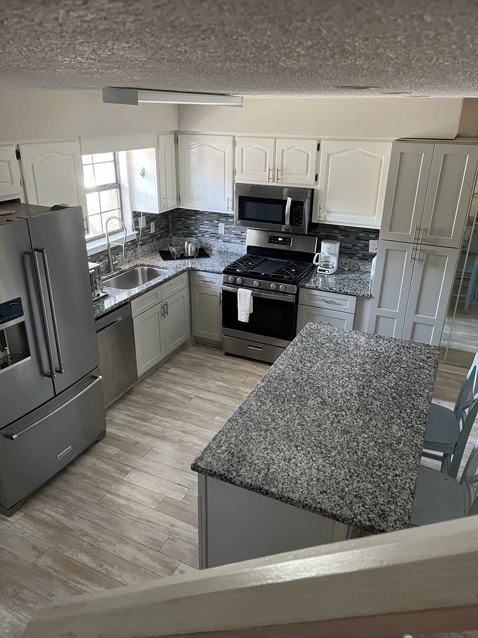 Updated kitchen; French door refrigerator filtered water &  ice in door;  pantry