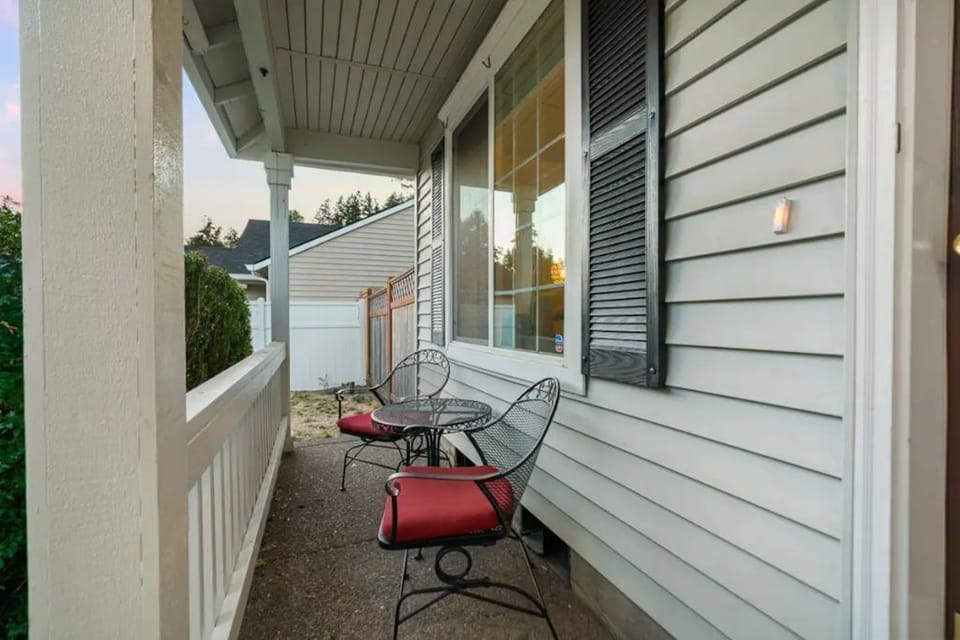 Relax in our front porch seating area