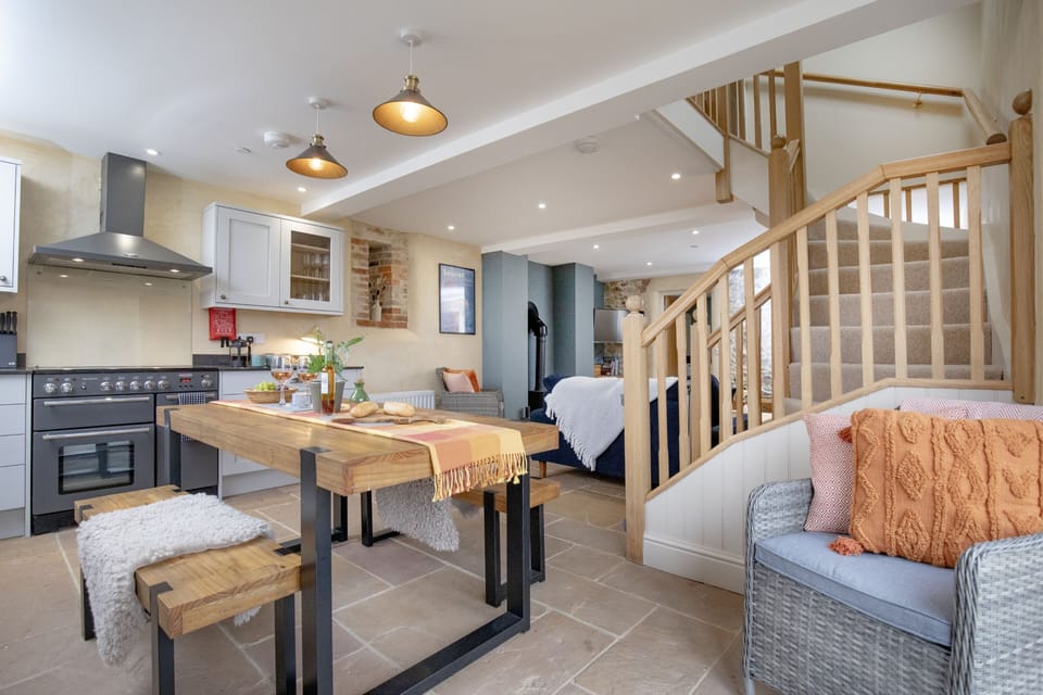 The Barn, Dorset: The dining kitchen with range cooker has plenty of space for entertaining