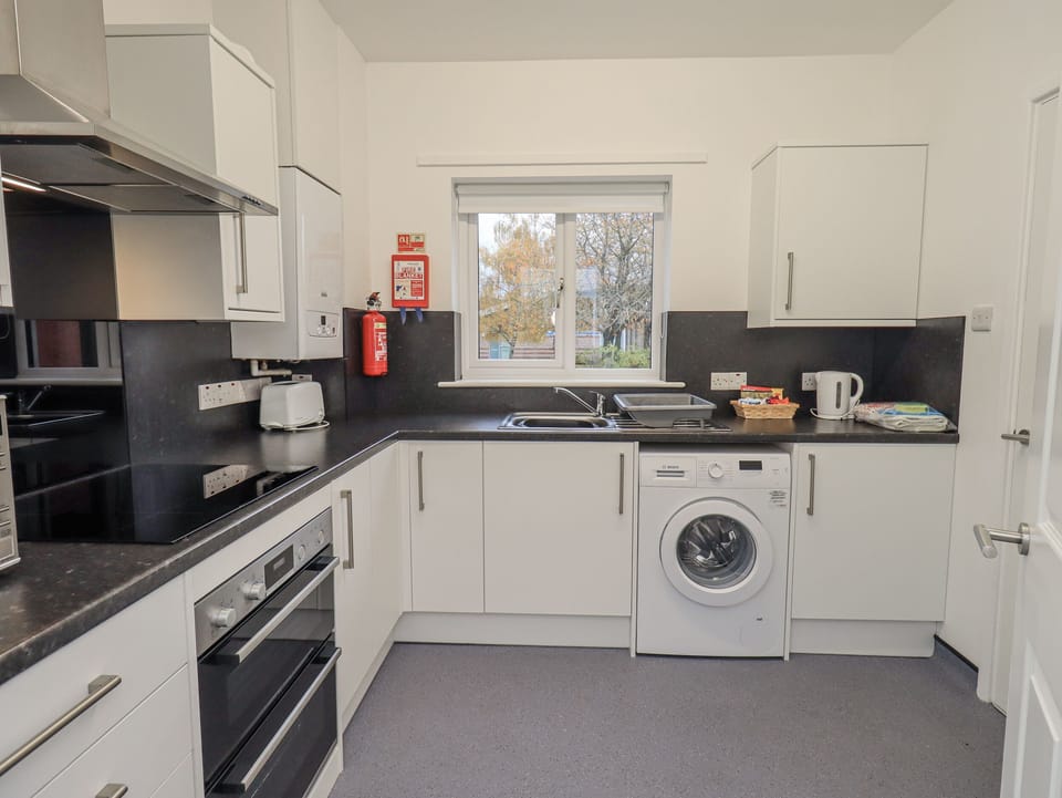 Fridge, electric kettle, toaster, cookware/dishes/utensils