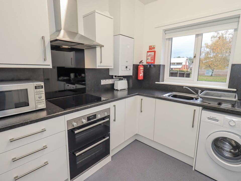 Fridge, electric kettle, toaster, cookware/dishes/utensils