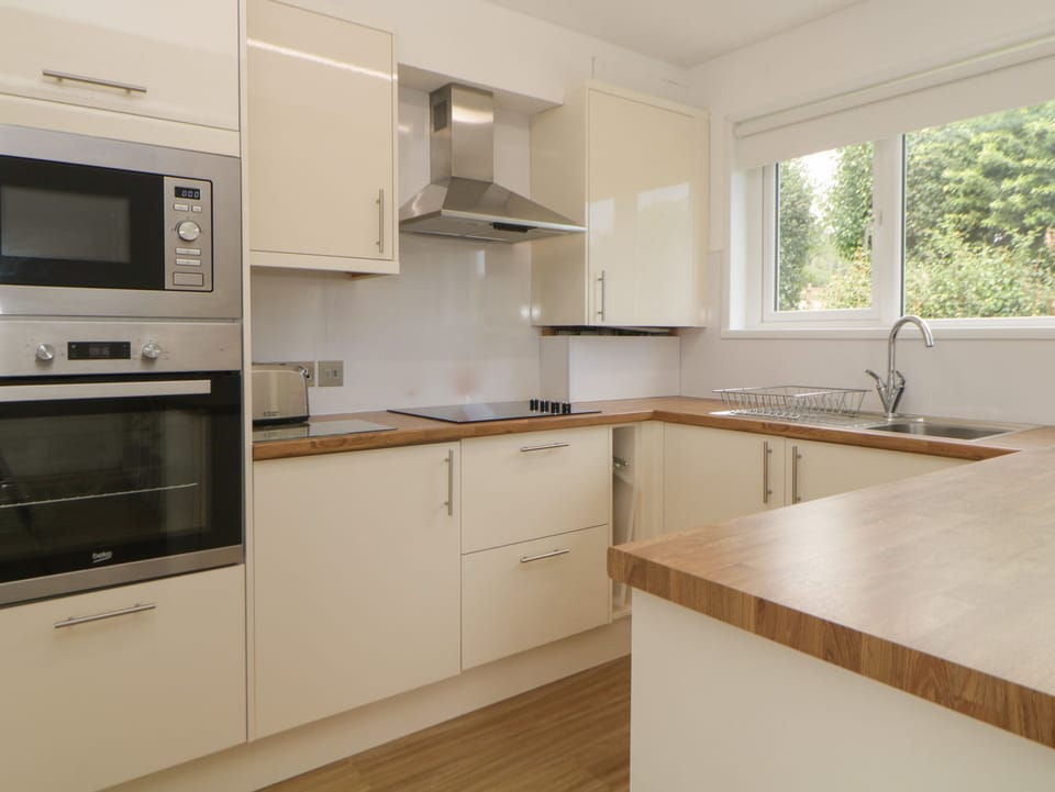 Fridge, electric kettle, toaster, cookware/dishes/utensils
