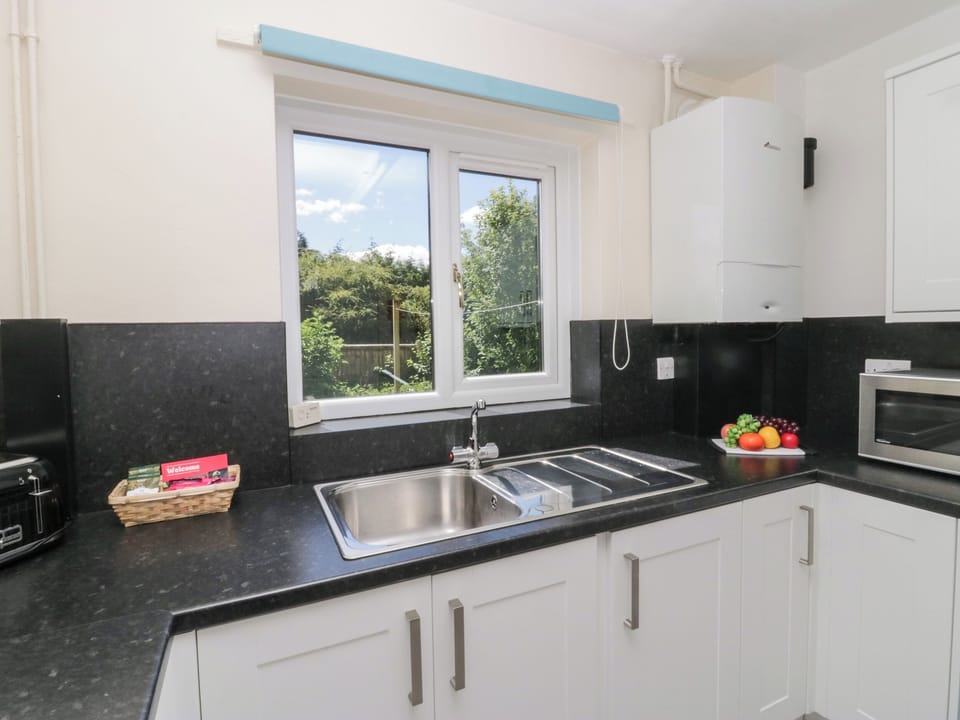 Fridge, electric kettle, toaster, cookware/dishes/utensils
