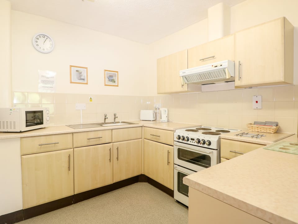 Fridge, electric kettle, toaster, cookware/dishes/utensils