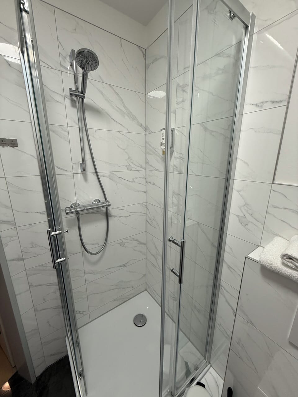 Standard Double Room | Bathroom | Shower, hair dryer, towels, soap