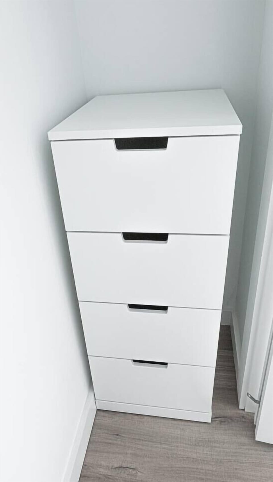 Four drawer dresser in master bedroom closet