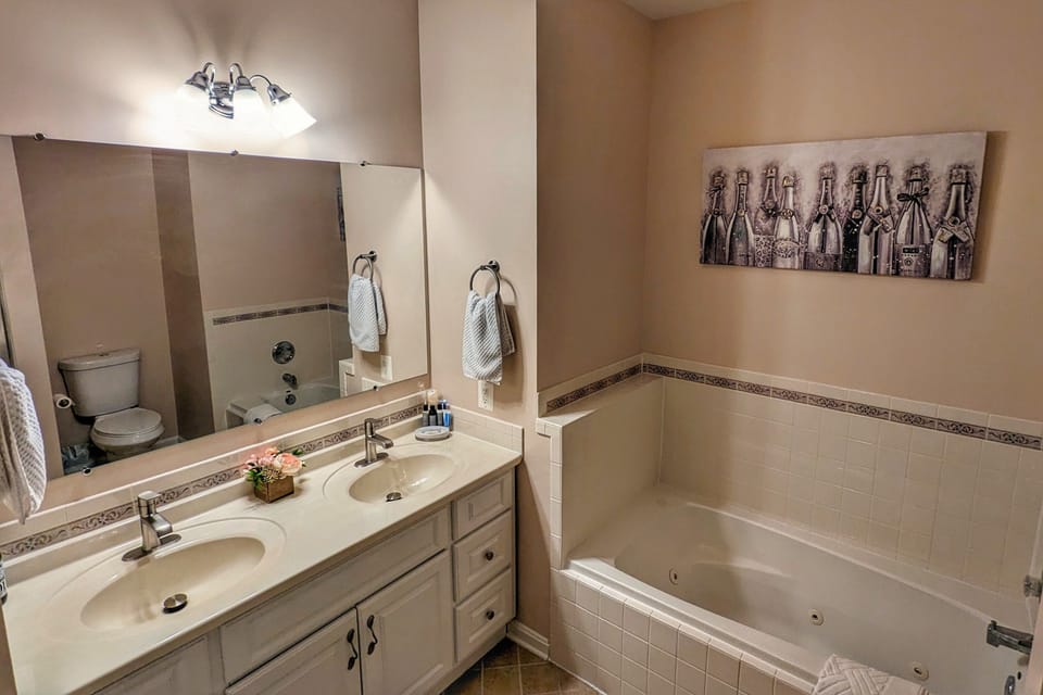 Master Bathroom: His & Hers sinks, full standing shower and tub 