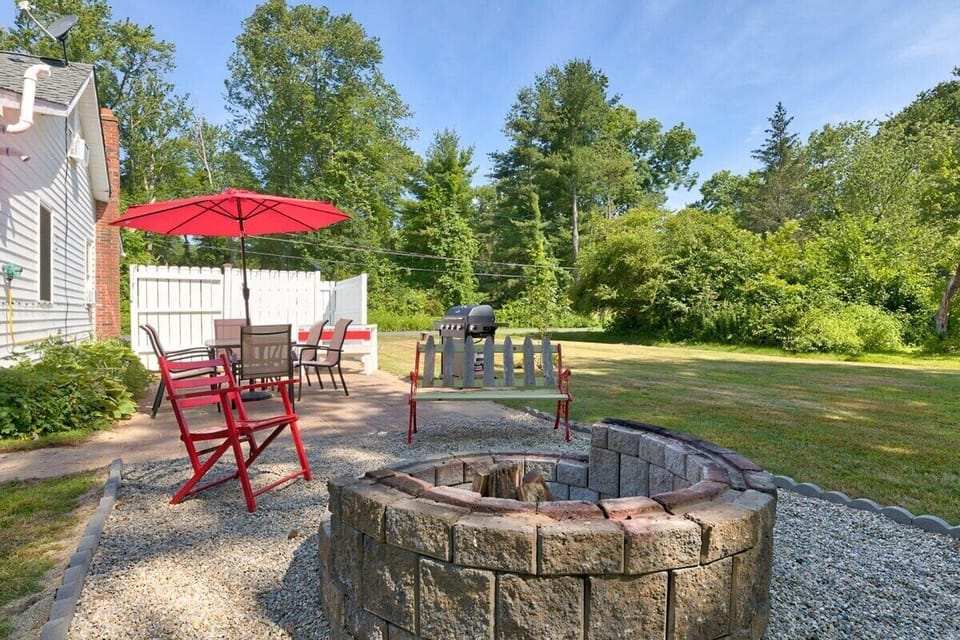 [Patio] Embrace an evening painted with sunset hues, under a starlit sky, cocooned by the warmth of a flickering fire pit...