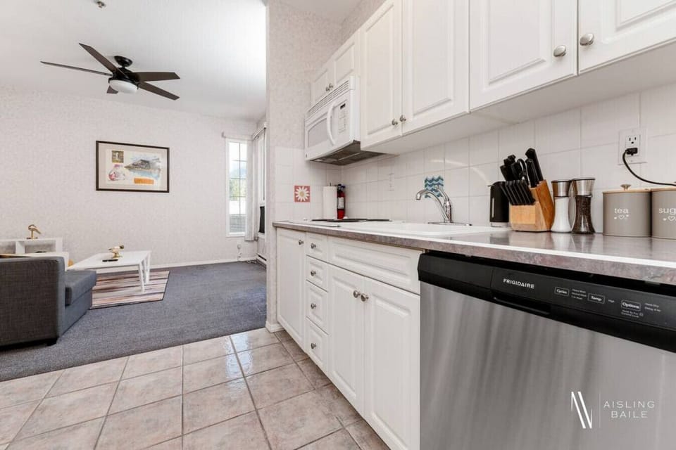 Kitchenette with a drip coffee machine, ground coffee, tea, sugar and basic condiments (ketchup, mustard and relish.) Please note that this unit does not have a conventional oven.