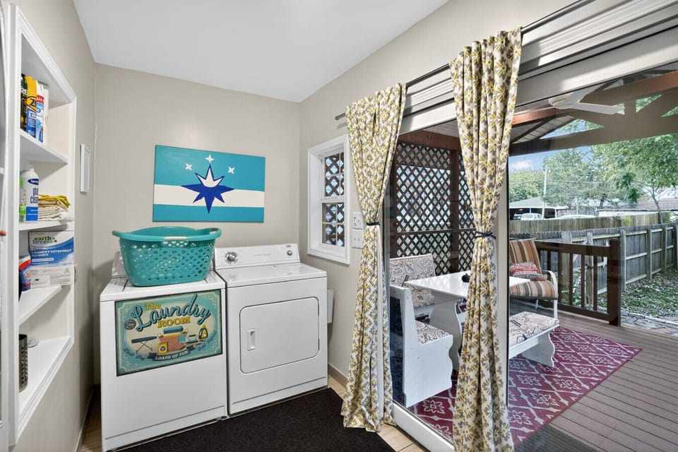Packing light? The Cherry St House main floor laundry room- washer, dryer, iron, ironing board is here to help!