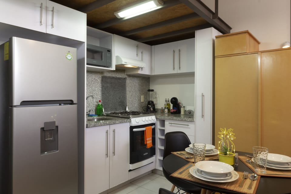 Microwave, blender, cleaning supplies, freezer