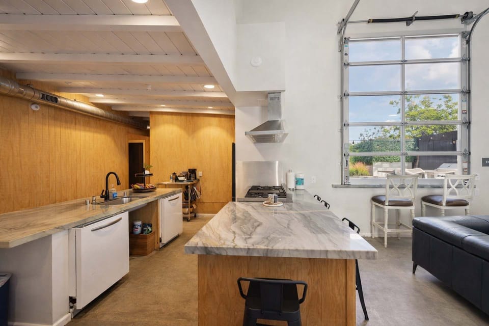 Kitchen: Two islands and 48 inch gas, cooktop and oven. ADA accessible. Stocked with all utensils plates pans. Starter coffee and machine included.