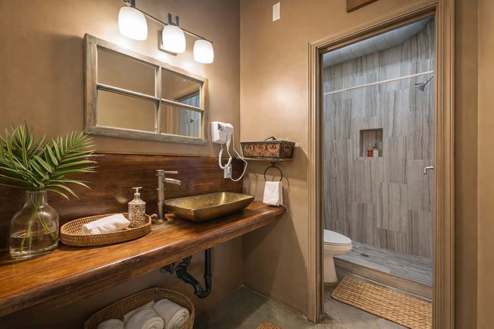 Spa-Inspired Bathroom with Walk-In Rain Shower • Premium Finishes, Thoughtful Amenities and a Relaxing Atmosphere • Refresh and Recharge Between Meetings, Adventures and Group Activities • Designed for Comfort During Extended Stays and Large Group Ge