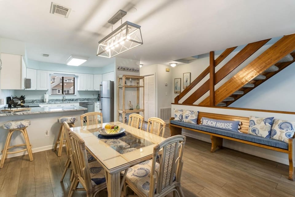 Cook together, eat together — the open kitchen and dining room are built for your whole group to gather.